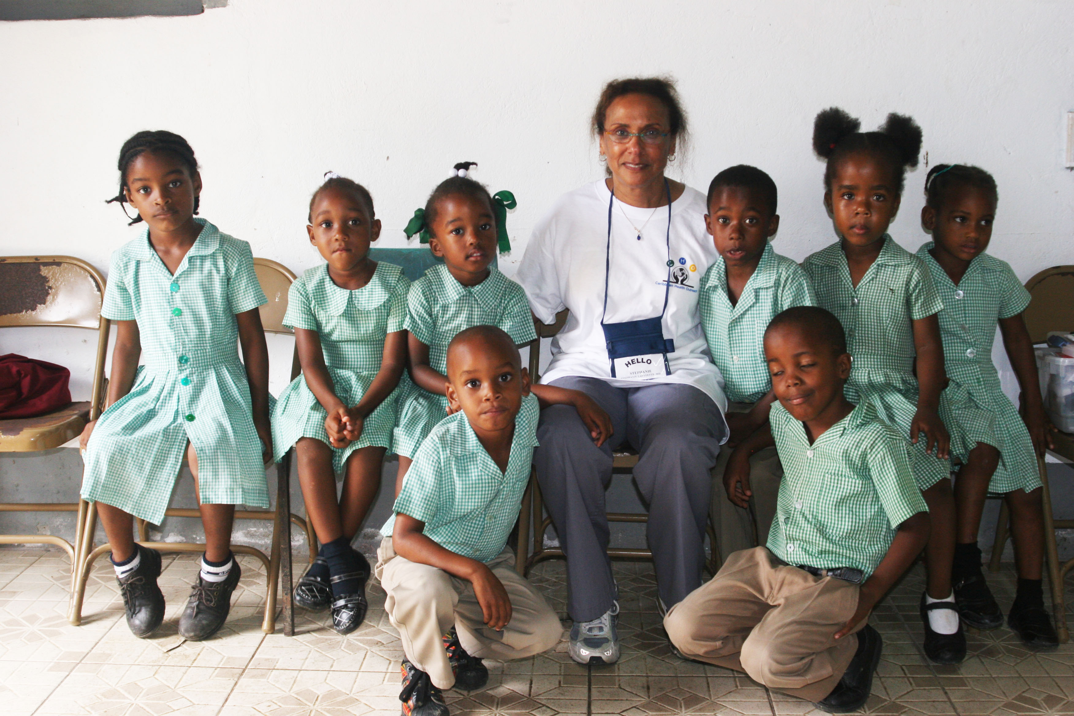 Children receiving healthcare at CHO event