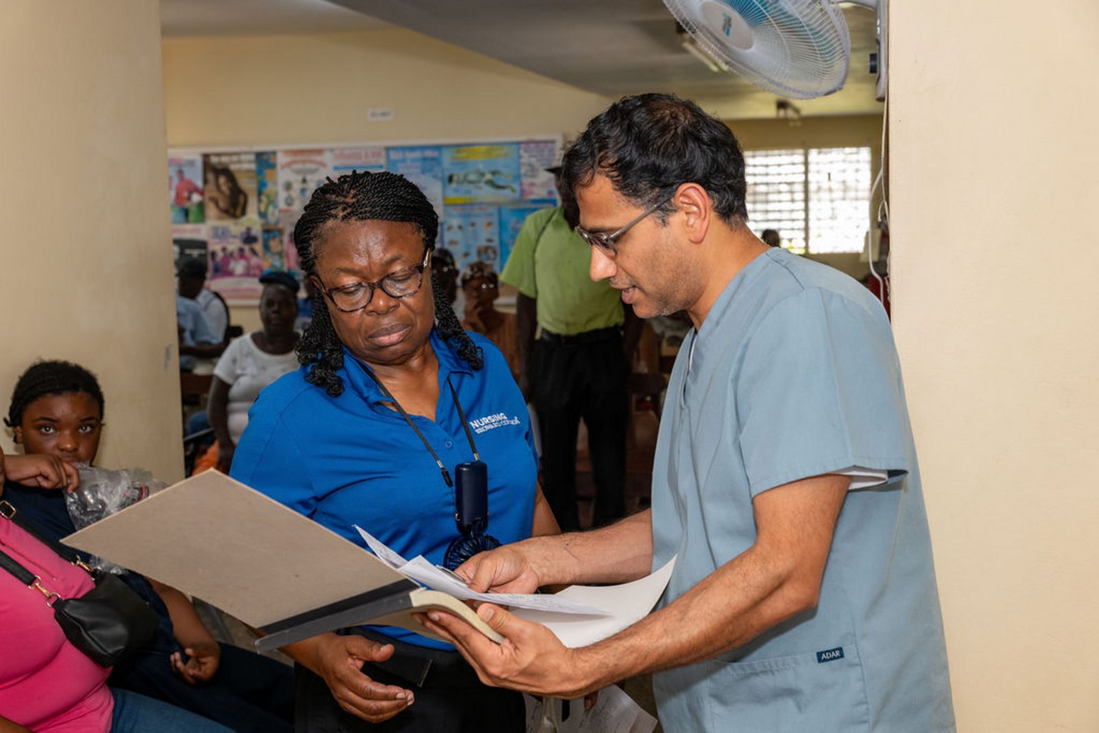 Health Week 2025 clinic team reviewing patient records