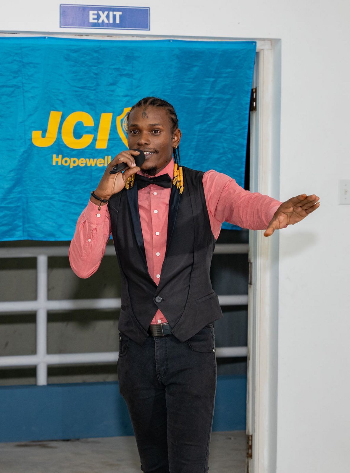 Health Week 2025 partner remarks with Hanover Charities and JCI banners